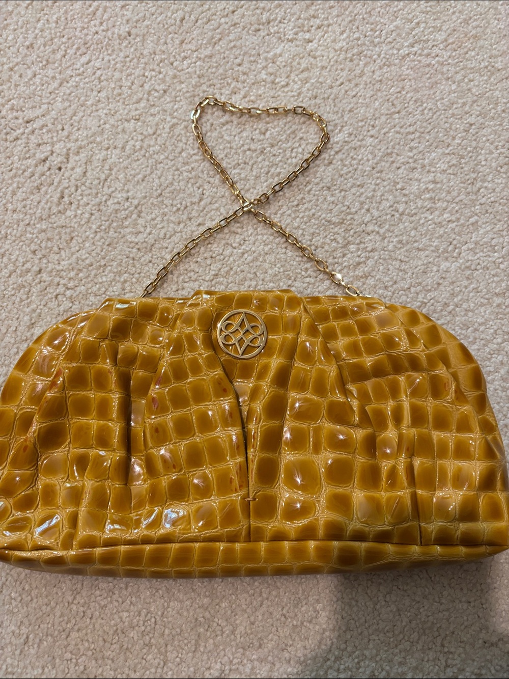Glossy Mustard Croc-Embossed Chain Wristlet Clutch. Antonio Melani. Gold details